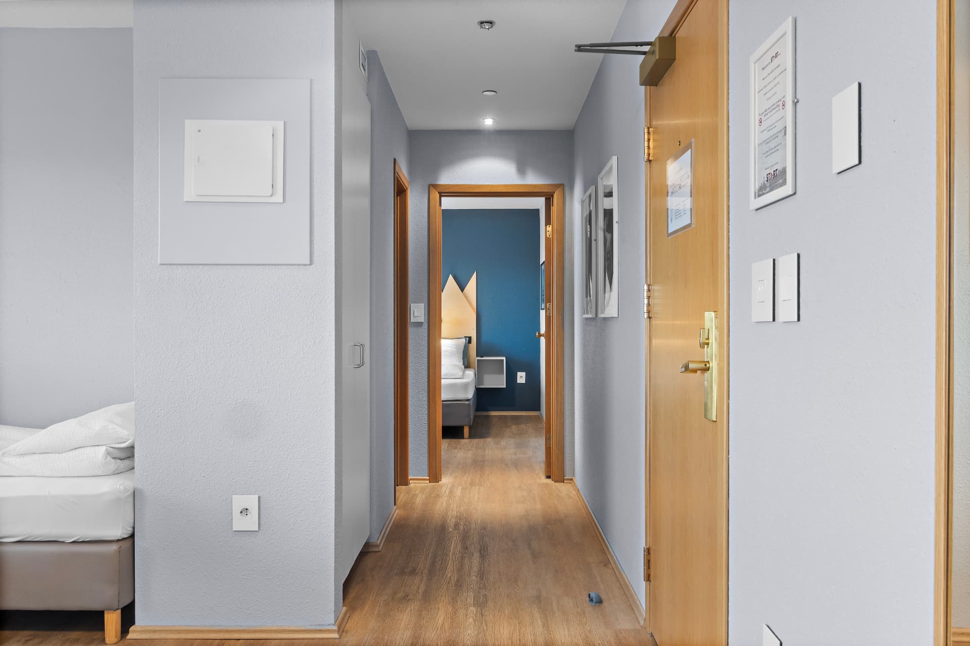 Hallway inside the family room connecting two bedrooms at START Hostel